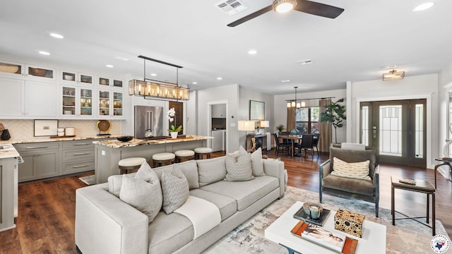 6917 Woodmere Ct, Texarkana, TX 75503 - living area with a chandelier, recessed lighting, a ceiling fan, and dark wood finished floors