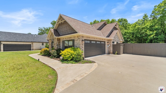 6917 Woodmere Ct, Texarkana, TX 75503 - view of front of property with driveway, roof with shingles, stone siding, an attached garage, and a gate