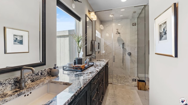 6917 Woodmere Ct, Texarkana, TX 75503 - bathroom with double vanity, a shower stall, recessed lighting, and tile patterned floors