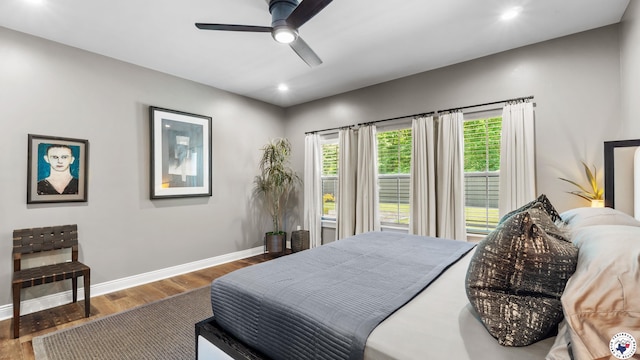 6917 Woodmere Ct, Texarkana, TX 75503 - bedroom with wood finished floors, baseboards, recessed lighting, and a ceiling fan