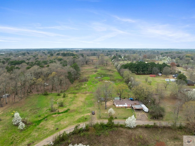 birds eye view of property featuring a rural view