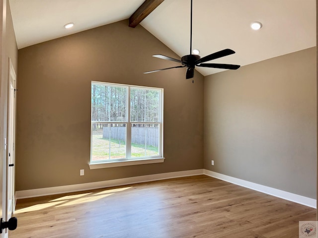 unfurnished room featuring a ceiling fan, wood finished floors, beam ceiling, and baseboards