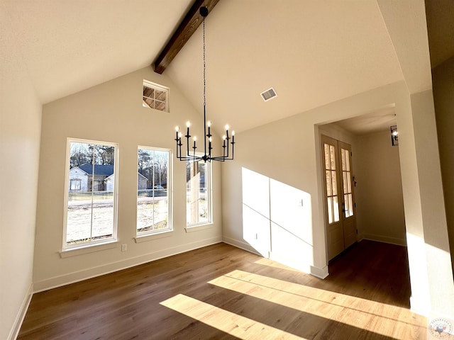 unfurnished dining area featuring beam ceiling, visible vents, an inviting chandelier, wood finished floors, and baseboards