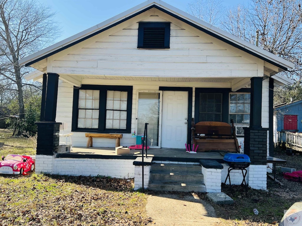 bungalow-style house with a porch