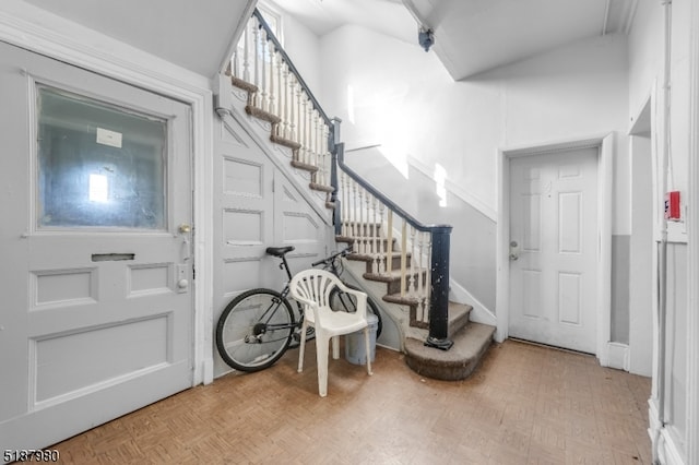 entrance foyer with light parquet floors