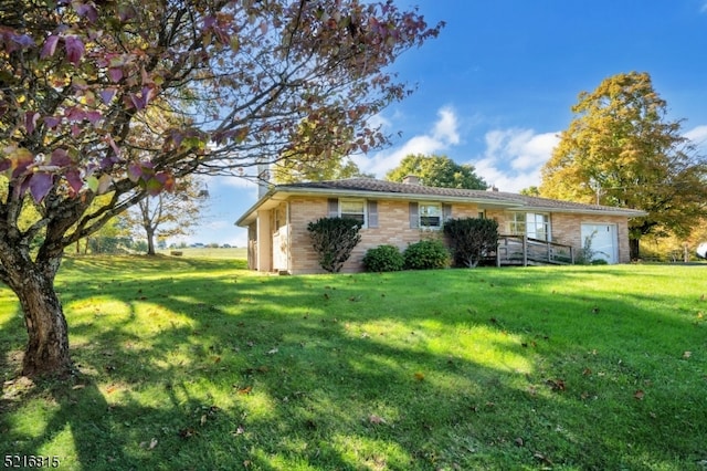 ranch-style home featuring a front yard