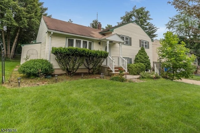 740 Mountain Ave, Bridgewater Twp, NJ 08805 - tri-level home featuring a front yard and a chimney