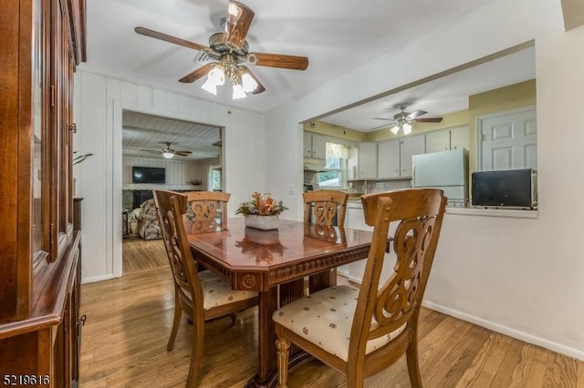 740 Mountain Ave, Bridgewater Twp, NJ 08805 - dining area with light wood-type flooring and ceiling fan