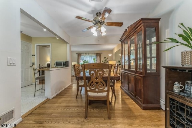 740 Mountain Ave, Bridgewater Twp, NJ 08805 - dining room featuring ceiling fan and light wood finished floors