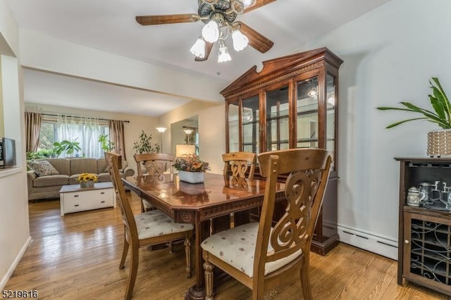 740 Mountain Ave, Bridgewater Twp, NJ 08805 - dining area with baseboard heating, light wood-style floors, a ceiling fan, and lofted ceiling