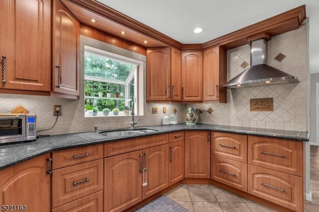 18 Cider Mill Ln, Washington Twp, NJ 07865 - kitchen featuring wall chimney range hood, a sink, brown cabinets, tasteful backsplash, and black electric cooktop
