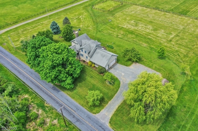 birds eye view of property featuring a rural view