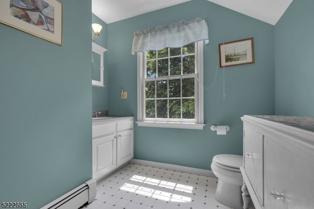 bathroom with vanity, plenty of natural light, tile flooring, and toilet