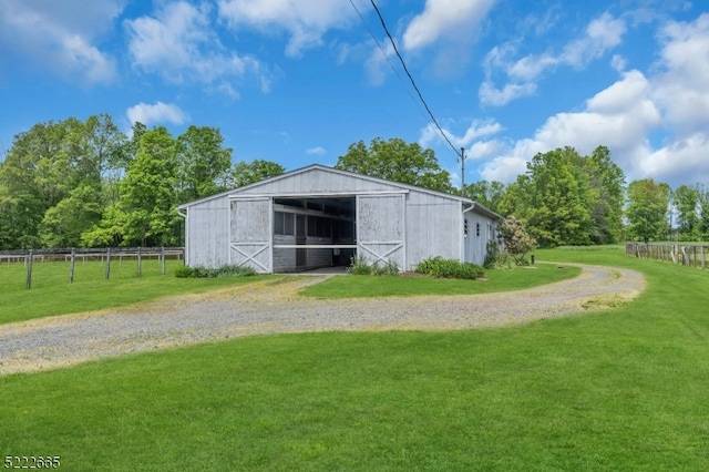 view of shed / structure with a yard