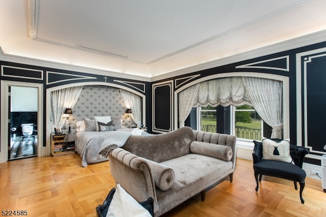 bedroom featuring light parquet floors