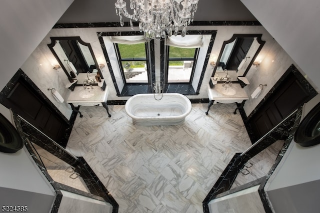 interior space with an inviting chandelier and tile floors