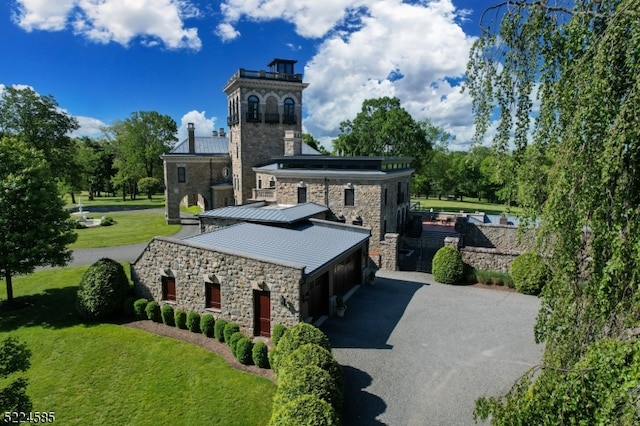 exterior space with a front lawn