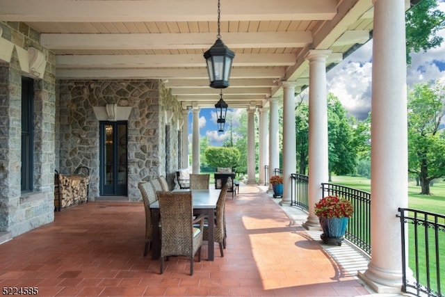 view of terrace featuring covered porch