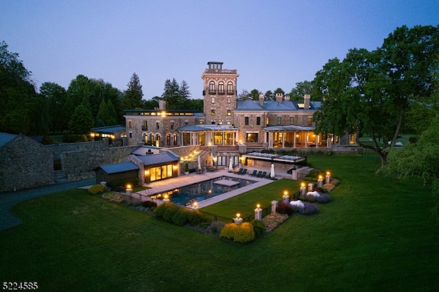 exterior space with a patio and a yard