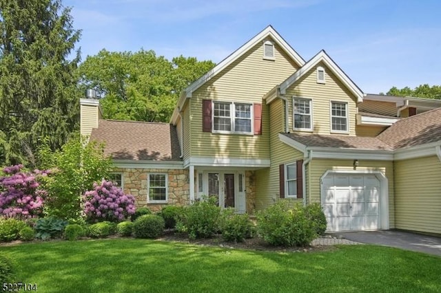 30 Northbridge Pl, Morris Twp, NJ 07960 - traditional-style house featuring a chimney, a front lawn, a shingled roof, driveway, and stone siding