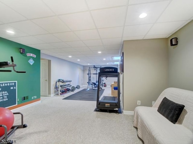 workout room with recessed lighting, a paneled ceiling, baseboards, and carpet floors