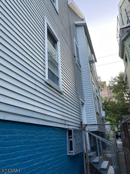 view of property exterior with a balcony