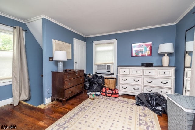 bedroom with dark hardwood / wood-style flooring and ornamental molding