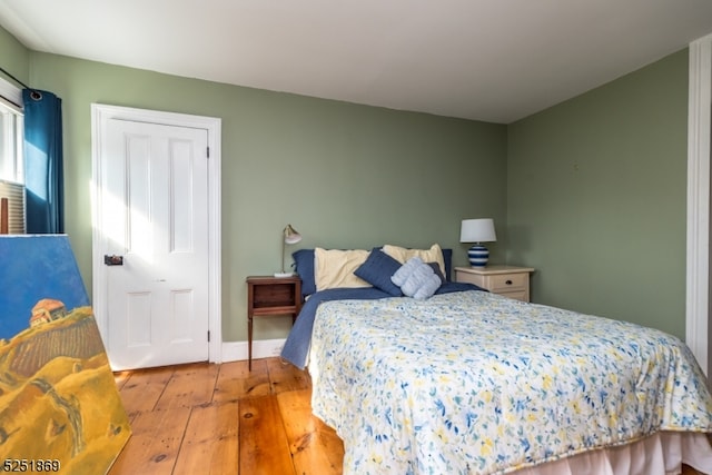 bedroom with light hardwood / wood-style floors