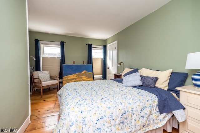 bedroom with light hardwood / wood-style flooring