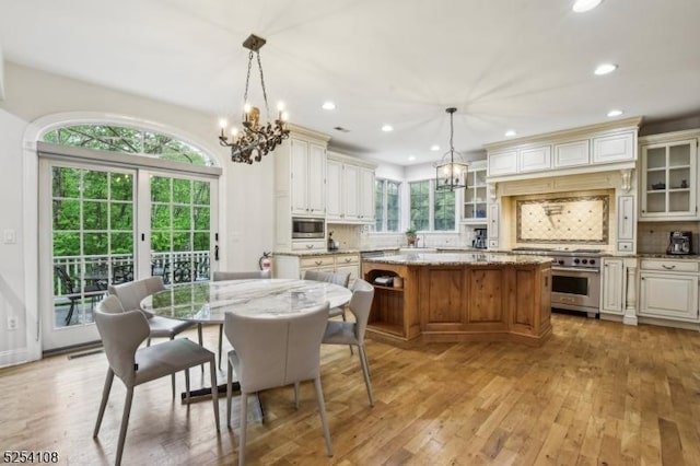 30 Clairvaux Ct, Bernards Twp, NJ 07920 - dining space with a chandelier, light wood-type flooring, and recessed lighting