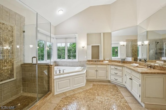 30 Clairvaux Ct, Bernards Twp, NJ 07920 - bathroom featuring a shower stall, tile patterned floors, a bath, double vanity, and high vaulted ceiling
