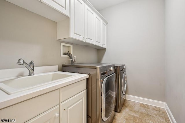 30 Clairvaux Ct, Bernards Twp, NJ 07920 - laundry area with cabinet space, washing machine and dryer, baseboards, and stone finish flooring