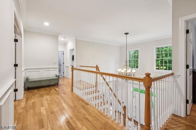 30 Clairvaux Ct, Bernards Twp, NJ 07920 - hallway featuring a chandelier, an upstairs landing, light wood finished floors, recessed lighting, and crown molding