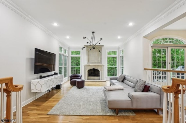 30 Clairvaux Ct, Bernards Twp, NJ 07920 - living room with wood finished floors, crown molding, recessed lighting, baseboards, and a fireplace with raised hearth
