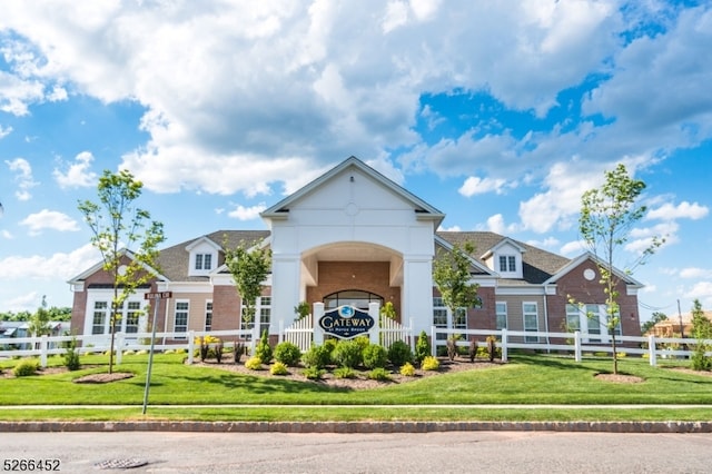 exterior space with a front lawn