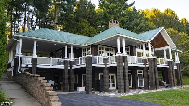 201 Lows Hollow Rd, Lopatcong Twp, NJ 08886 - rear view of property featuring metal roof