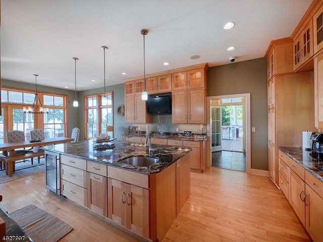 201 Lows Hollow Rd, Lopatcong Twp, NJ 08886 - kitchen featuring a kitchen island with sink, a sink, light wood finished floors, wine cooler, and recessed lighting