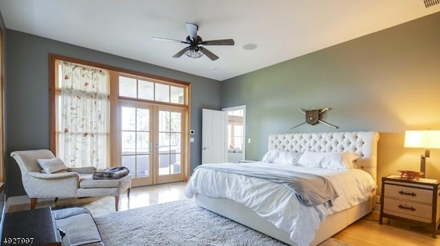201 Lows Hollow Rd, Lopatcong Twp, NJ 08886 - bedroom with a ceiling fan, access to exterior, french doors, and light wood-type flooring