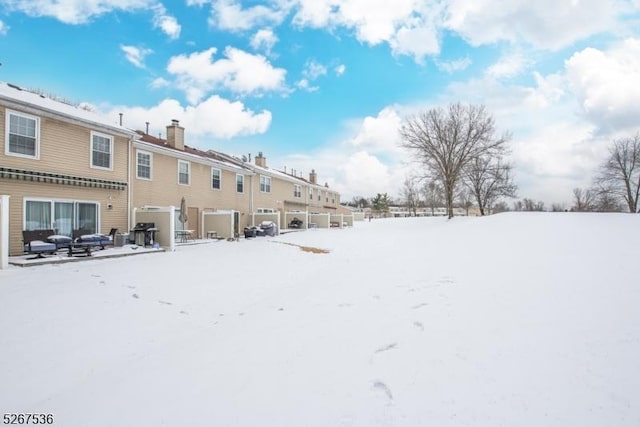 view of snowy yard