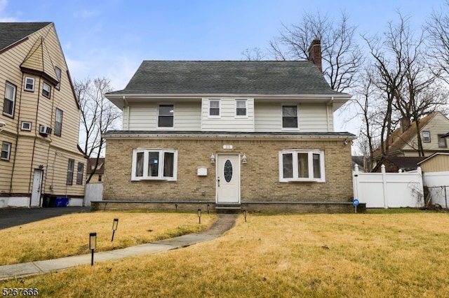 view of property featuring a front yard