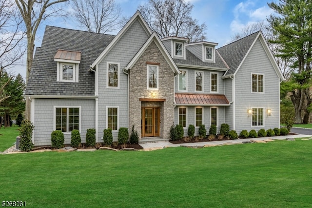 view of front of home featuring a front lawn