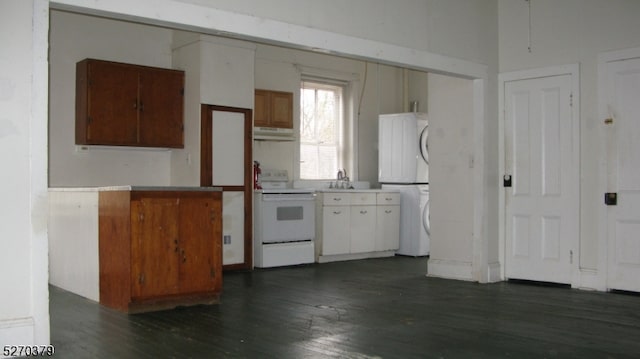 kitchen with white electric range, dark hardwood / wood-style floors, sink, and white cabinets