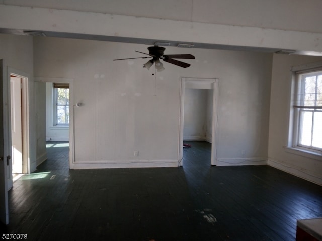 unfurnished room with wood-type flooring and ceiling fan