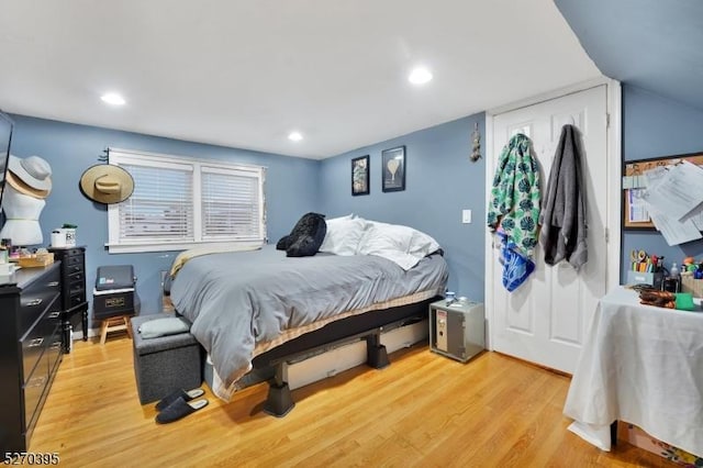 bedroom with light wood-type flooring