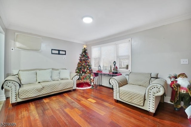 living room featuring hardwood / wood-style floors, radiator heating unit, and ornamental molding