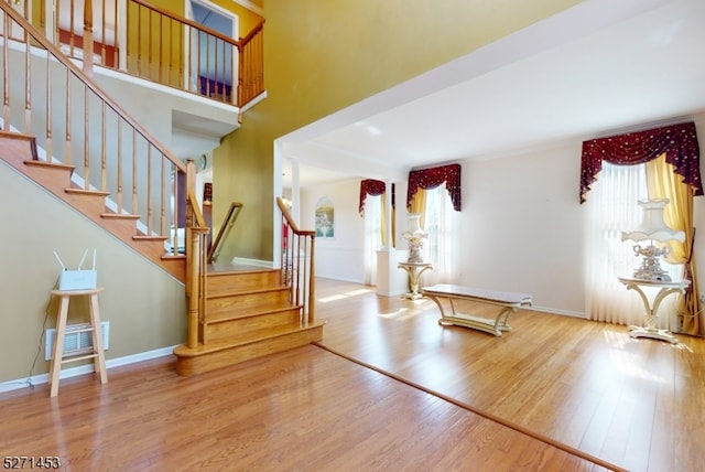 foyer entrance with light hardwood / wood-style flooring