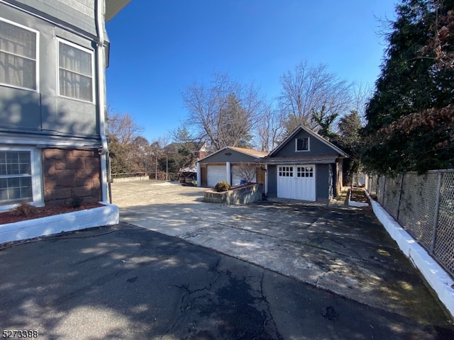 exterior space with a garage