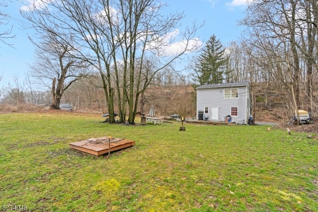 view of yard with a wooden deck