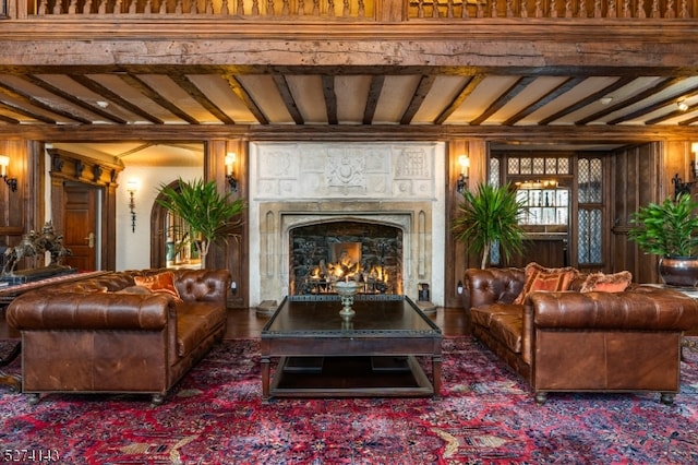 living room with beamed ceiling