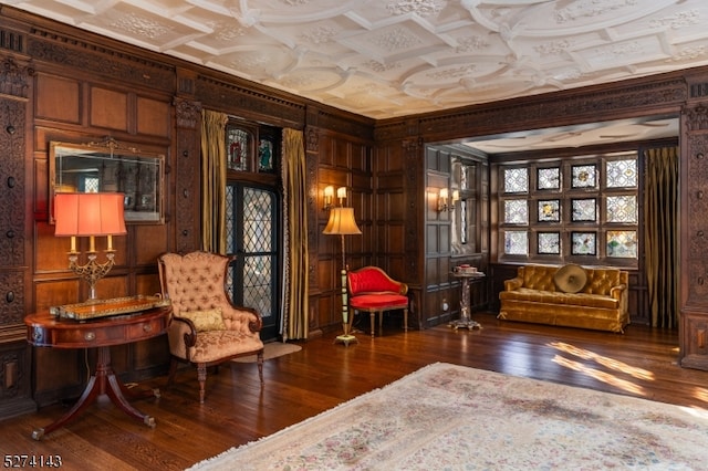 sitting room featuring dark hardwood / wood-style flooring